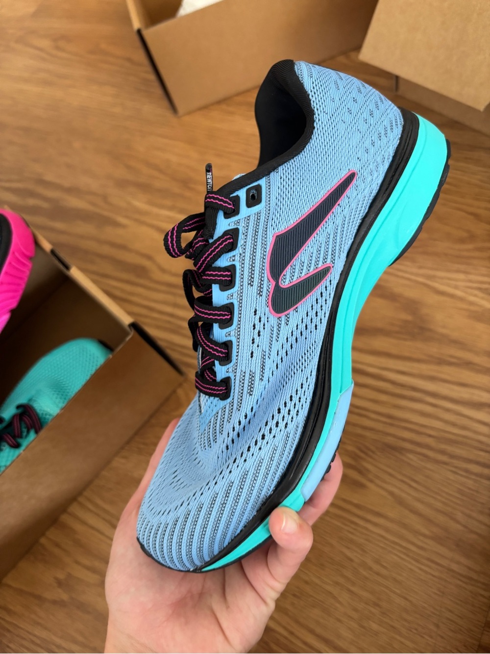 Newton Running Light Blue Women's Running Shoe with Teal Sole and Pink Accents